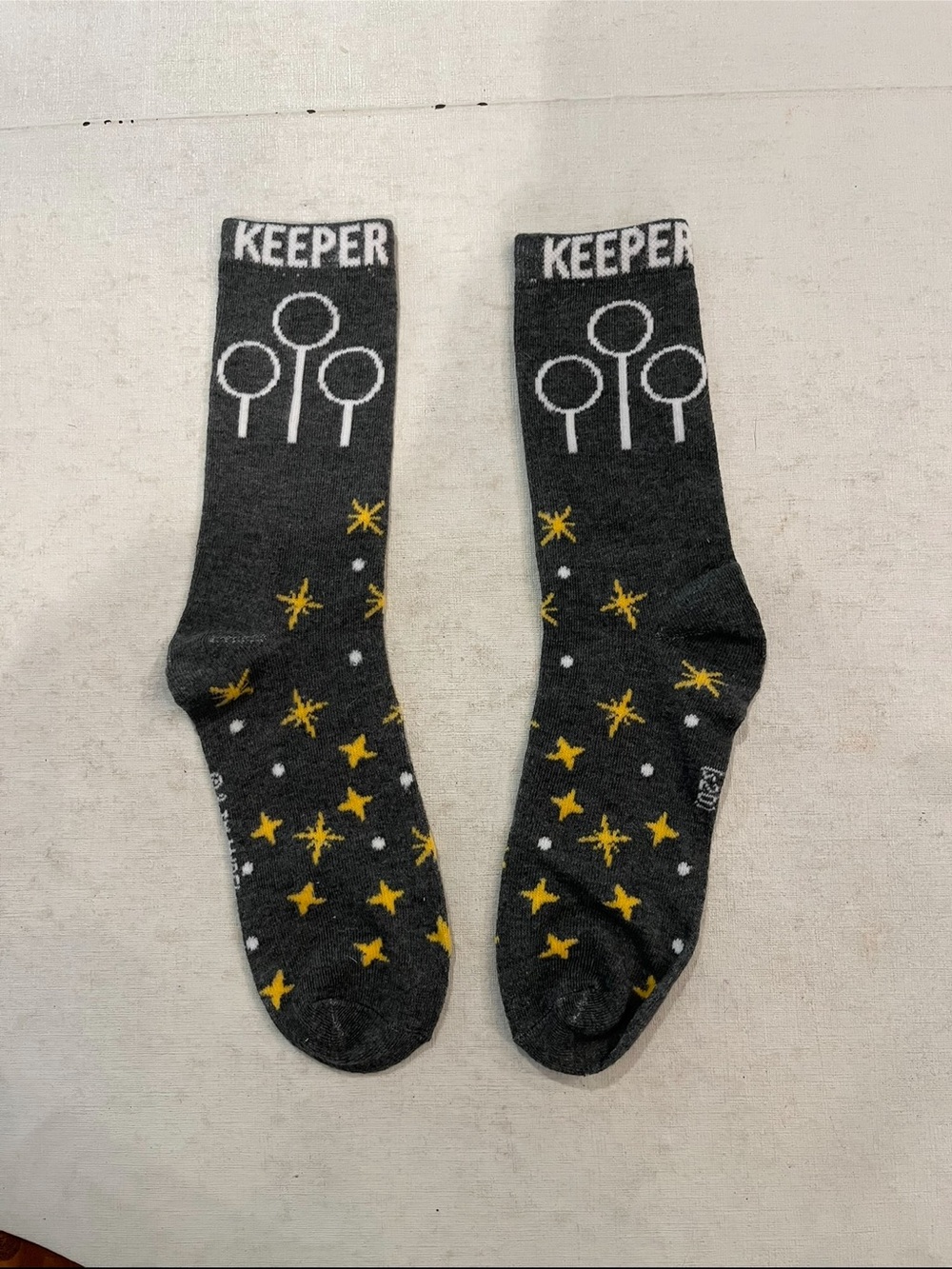 Harry Potter Dark Gray KEEPER Crew Socks with Yellow Star Pattern. GUC!